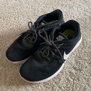 black and white Nike sneakers